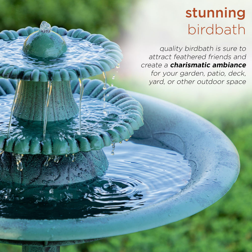 Alpine fountain in a garden setting with birds