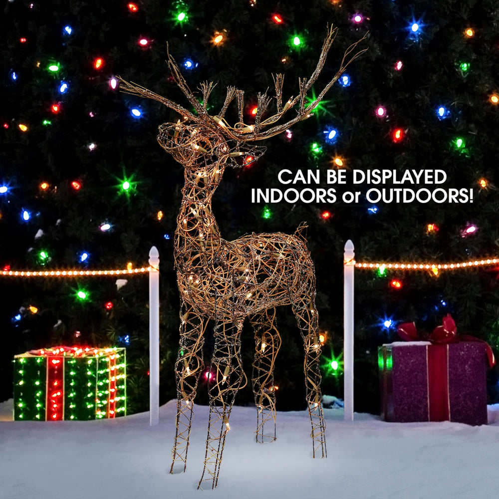 Alpine Rattan Reindeer displayed in a festive garden setting