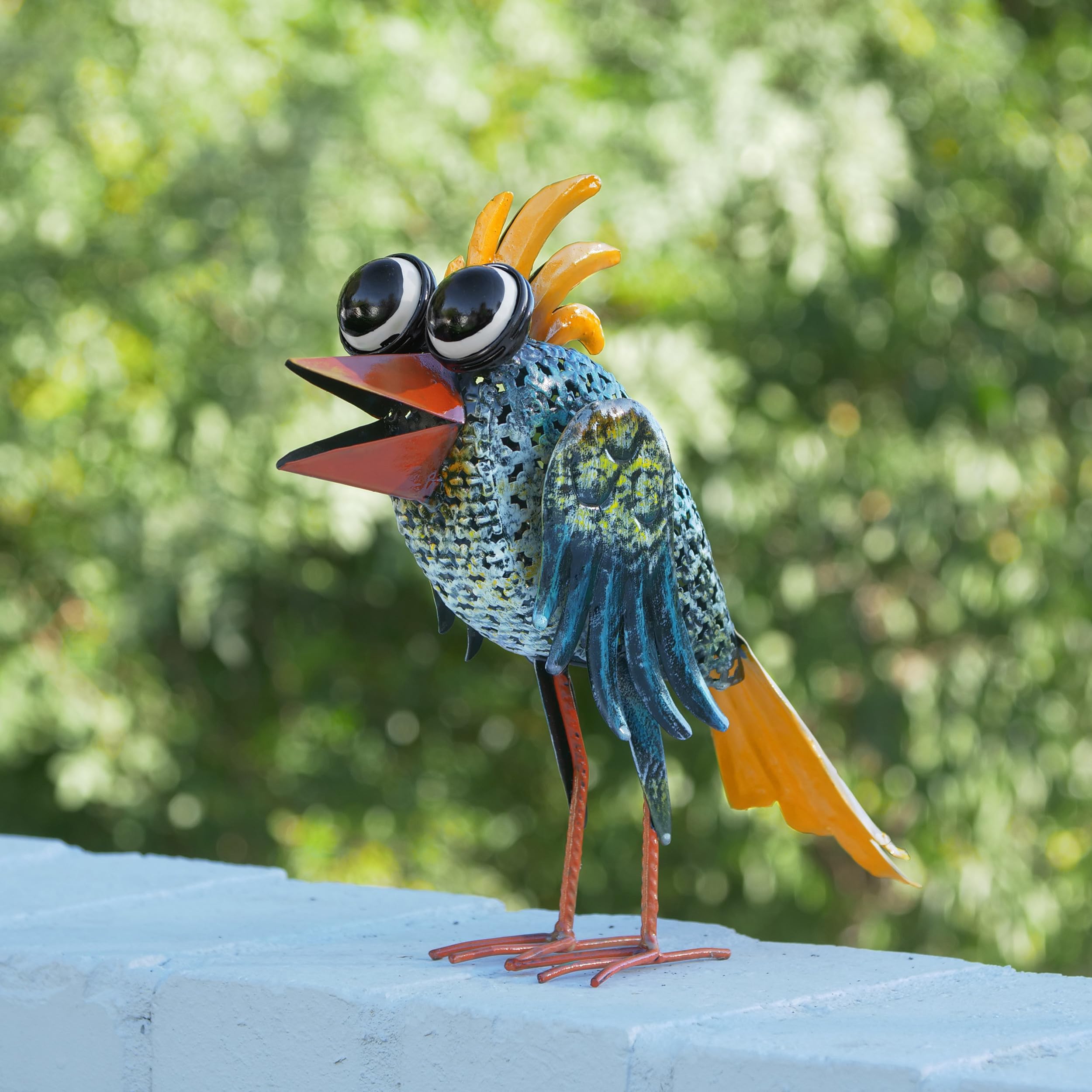 Alpine Wide-Eyed Bird Statue on a porch