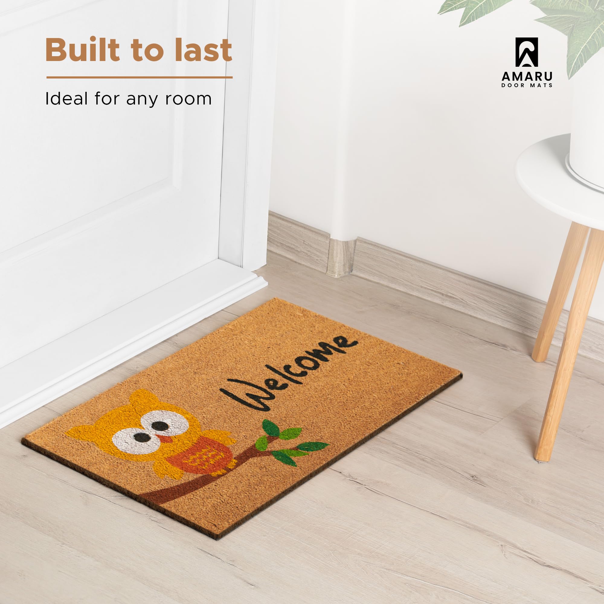 AMARU Coir Welcome Mat in a garden setting