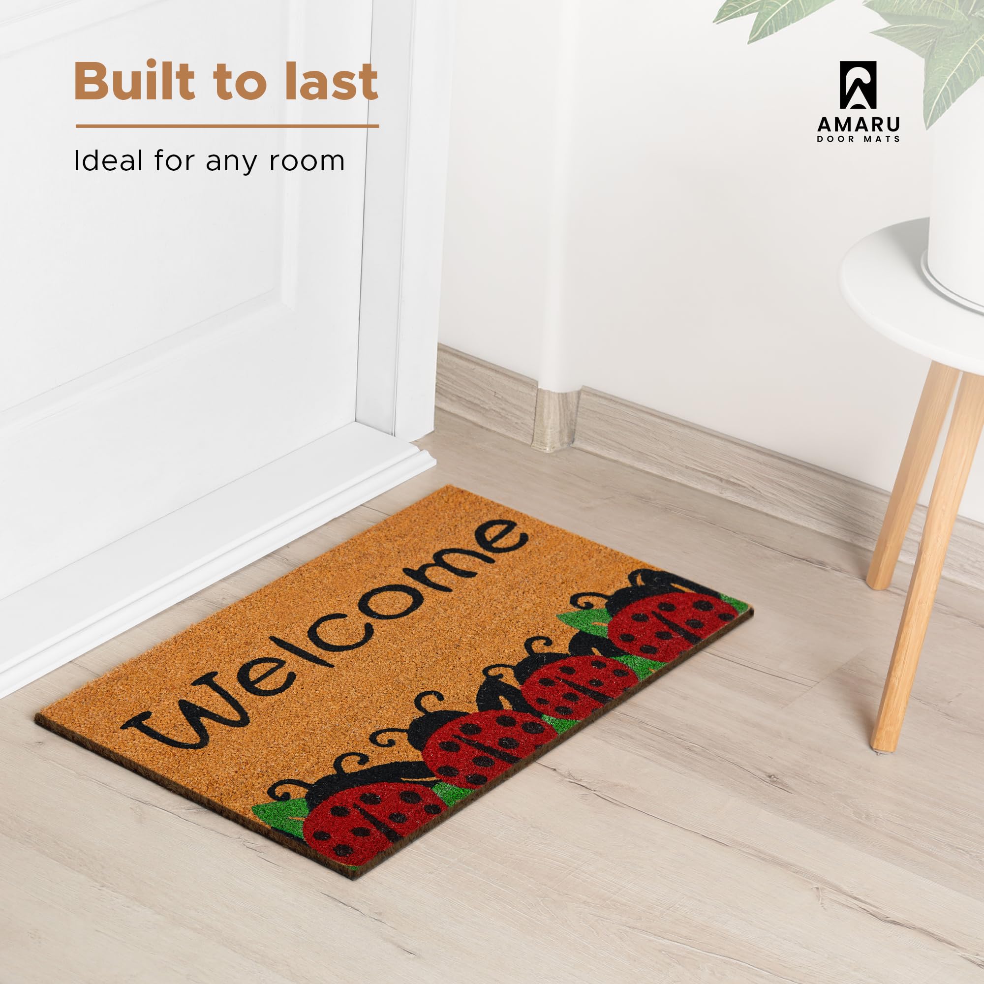 AMARU DOOR MATS Coir Welcome Mat in a garden setting