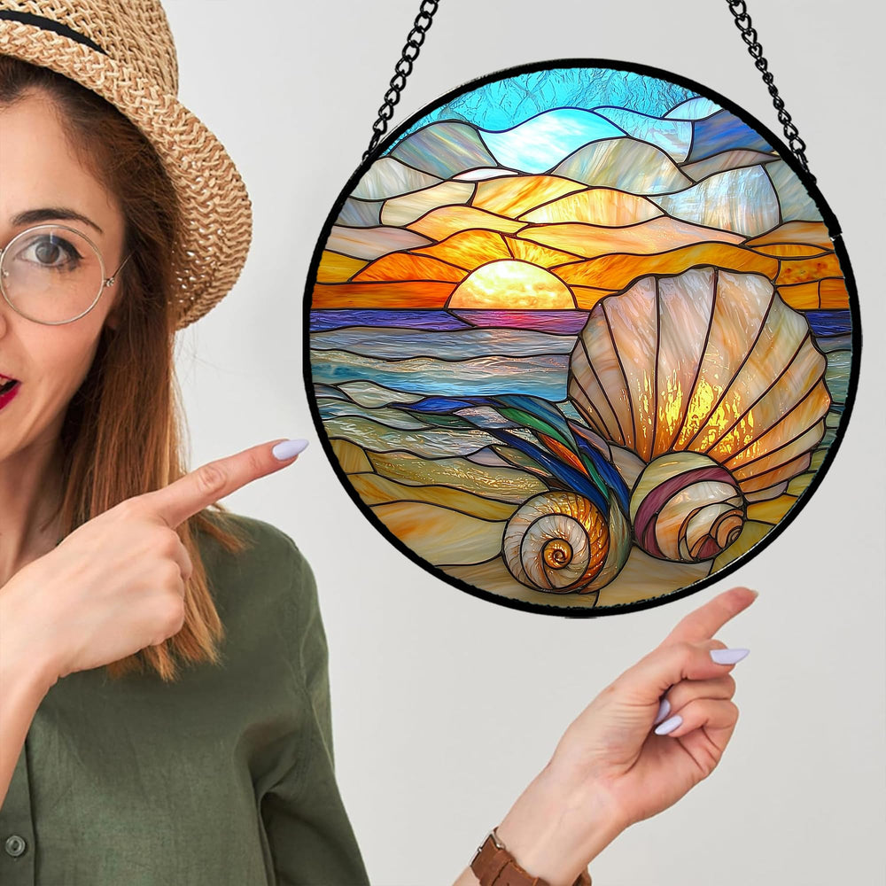 AMDERVEN Ocean Stained Glass Suncatcher hanging in a bright window