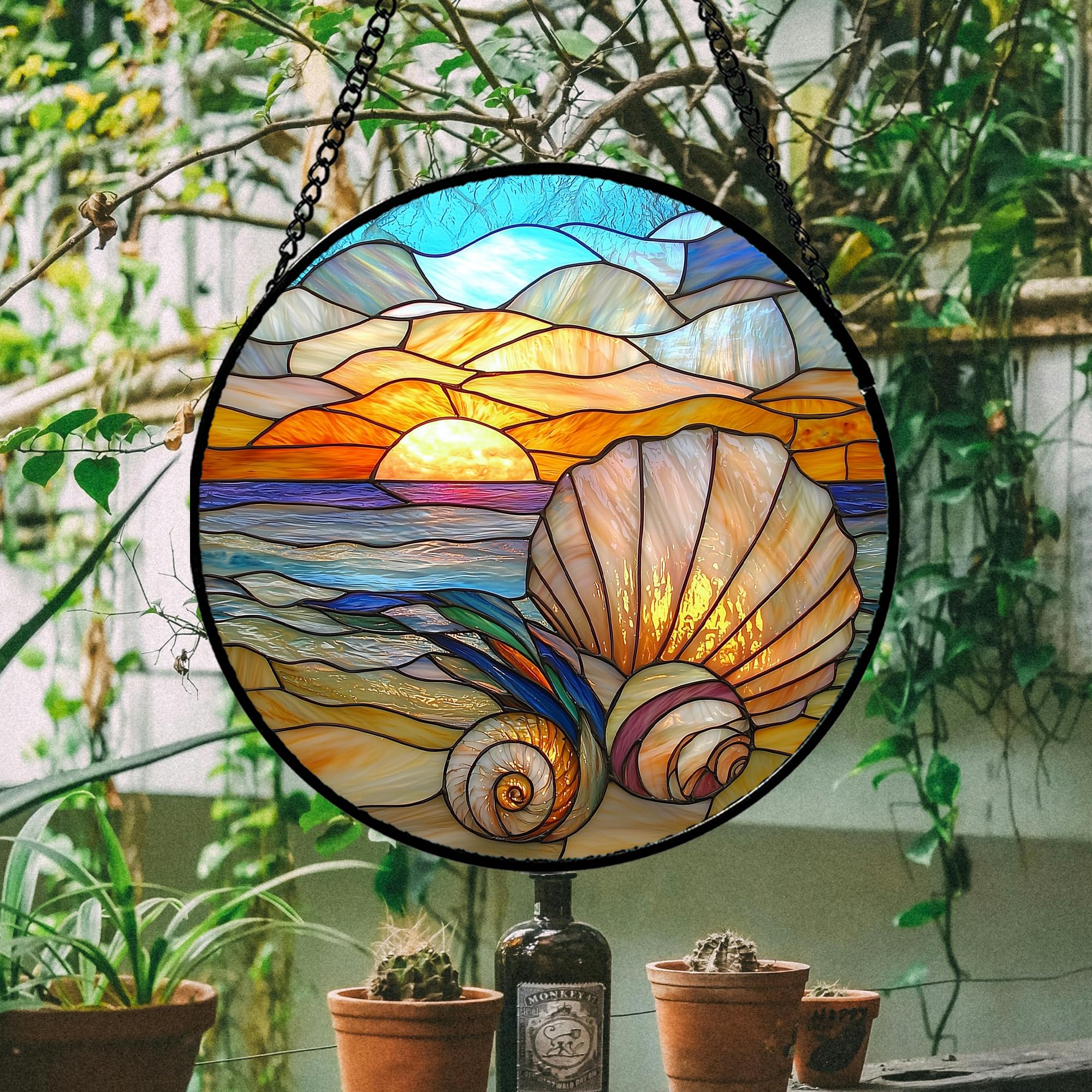 AMDERVEN Ocean Stained Glass Suncatcher showing colourful light reflection