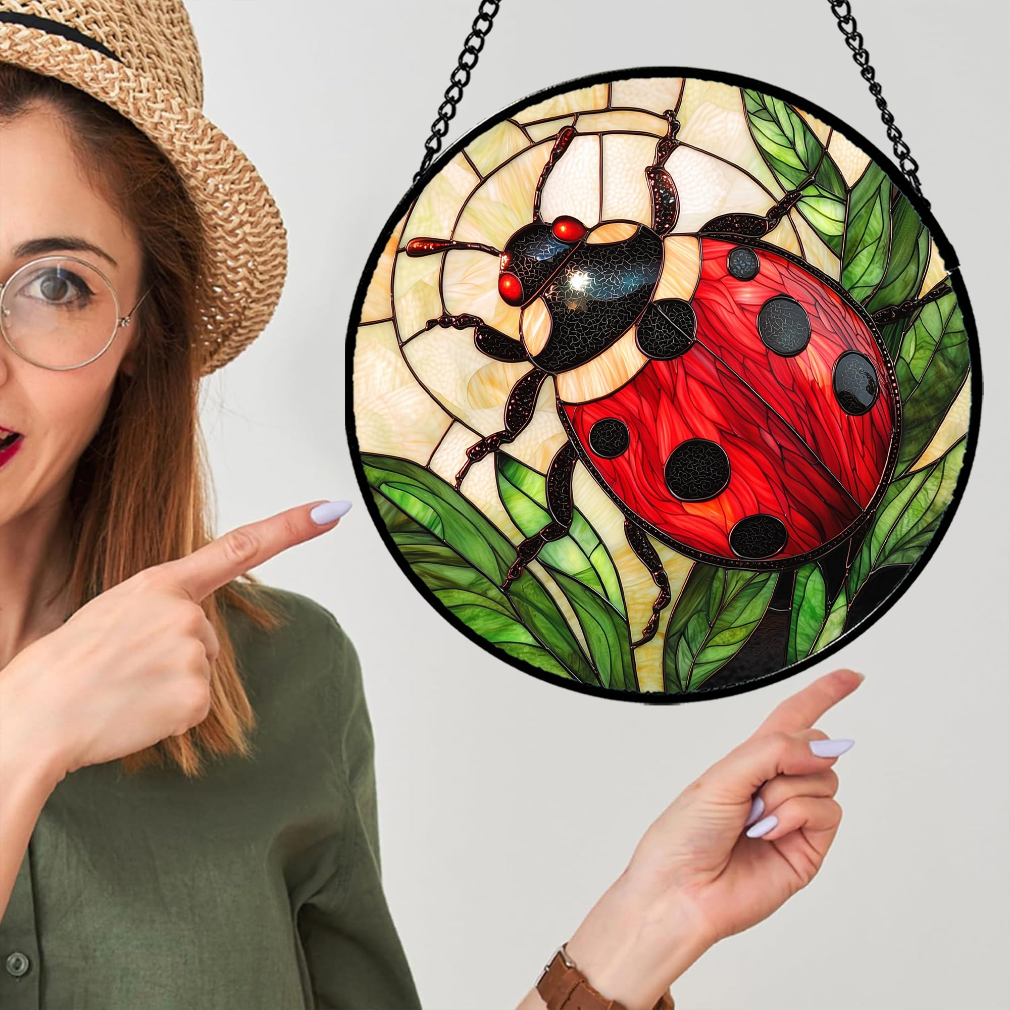 AMDERVEN Red Ladybug Suncatcher hanging in a sunny window