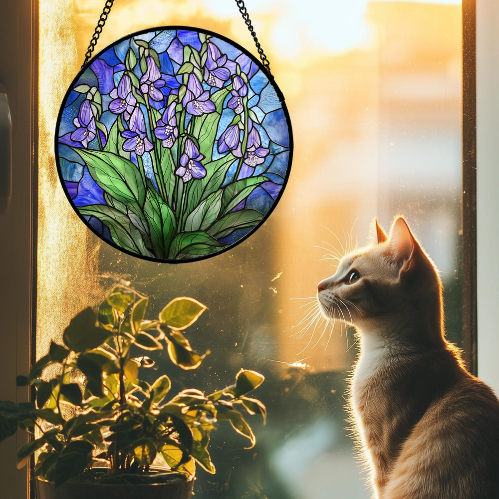 AMDERVEN Stained Glass Suncatcher hanging in a sunlit window
