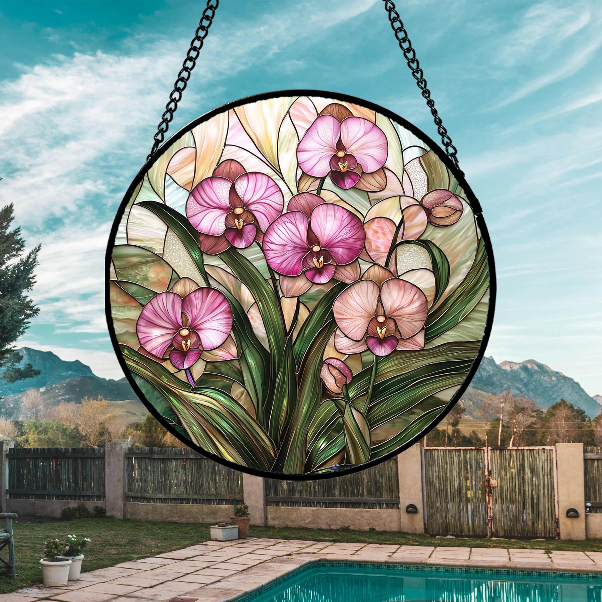 AMDERVEN Suncatcher hanging in a window with sunlight filtering through