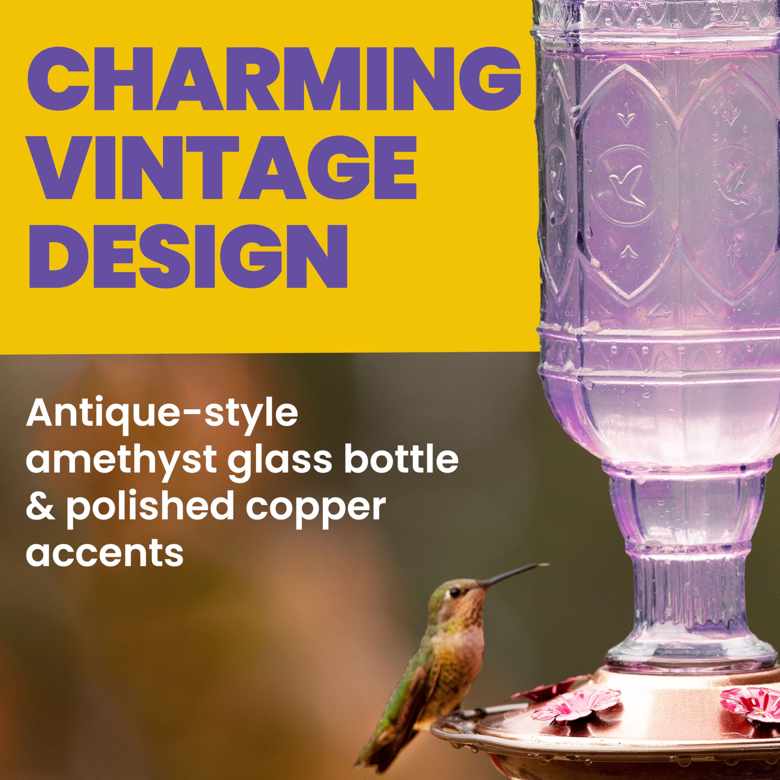Amethyst Jewel Hummingbird Feeder filled with nectar in a garden setting