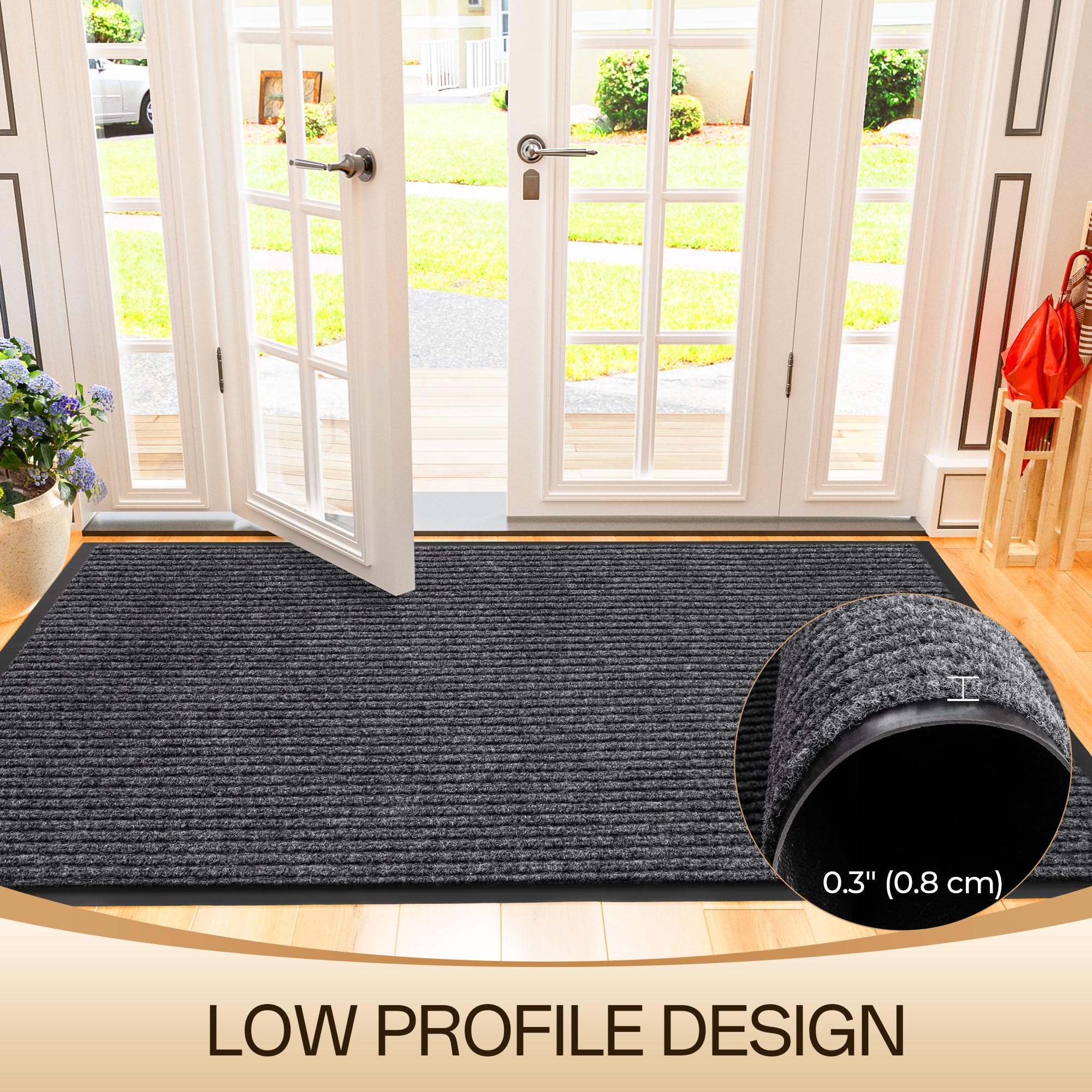 Amyracel Front Door Mat 2'x6' displayed with vacuum for cleaning