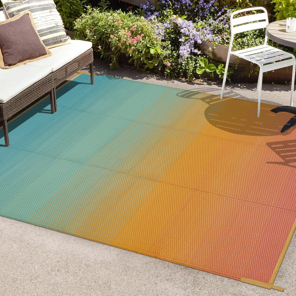Anidaroel 6x9ft Outdoor Rug, Orange and Blue gradient front view