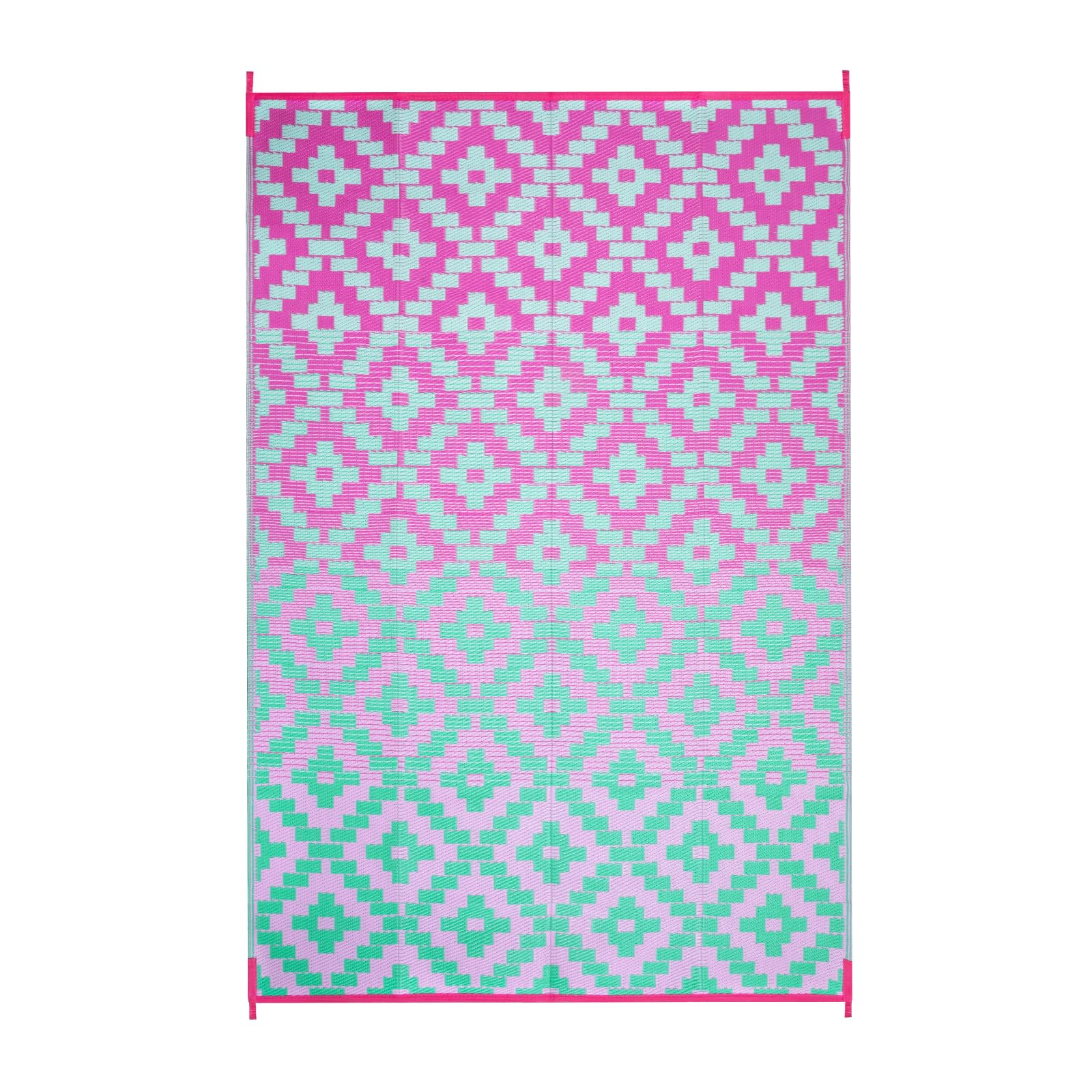 Anidaroel outdoor rug in garden setting, complementing flowers