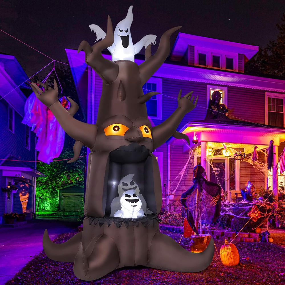 Animated ghosts hanging from the GOOSH inflatable dead tree