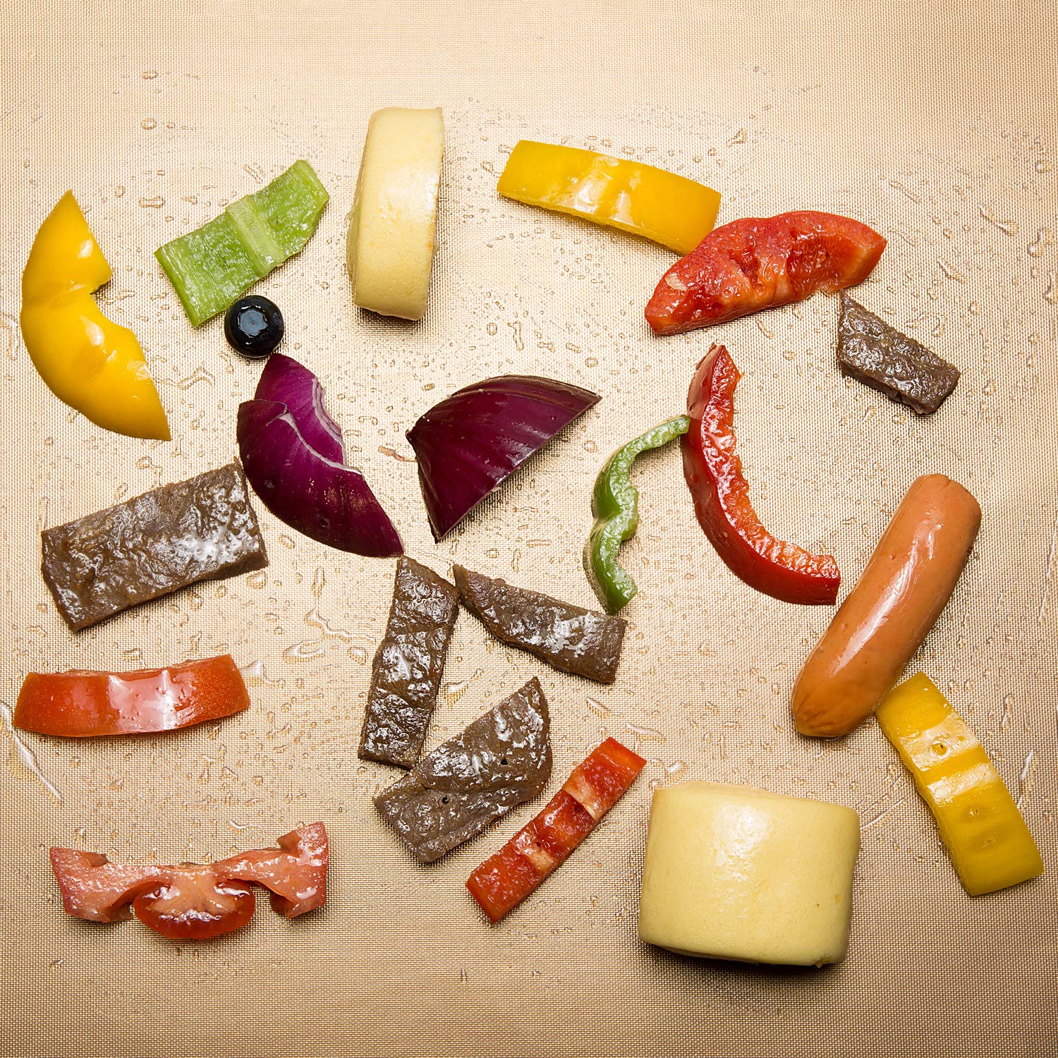 Aoocan Copper Grill Mat in use with grilled vegetables