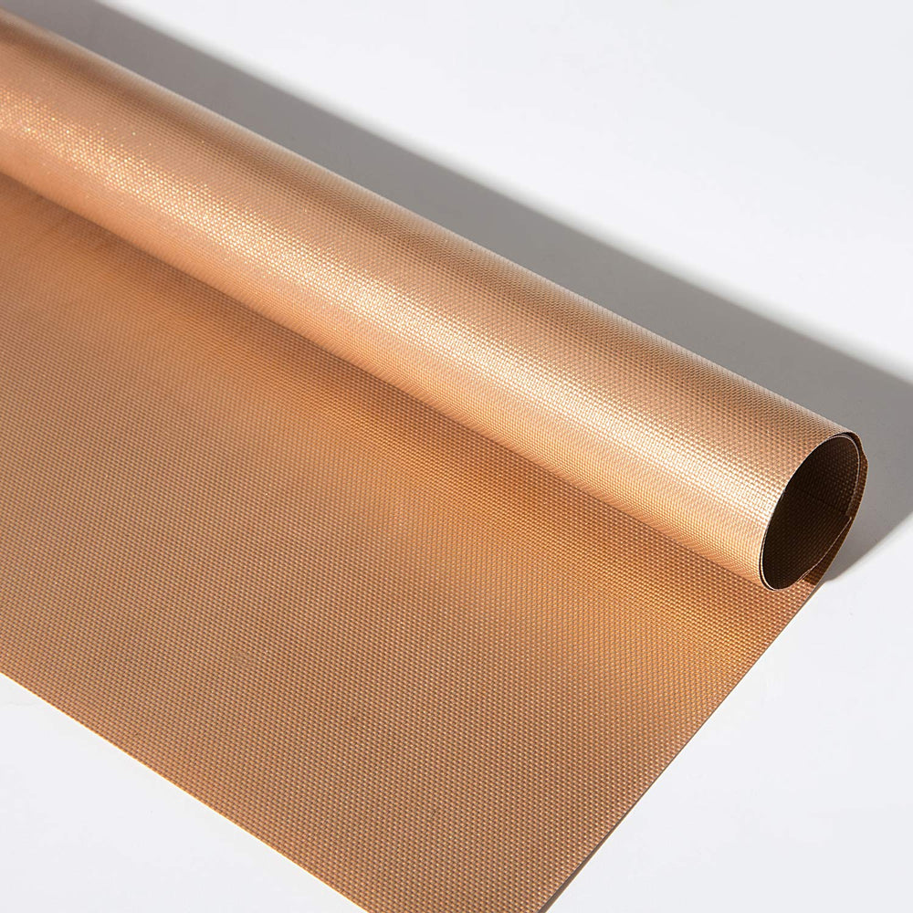 Aoocan Copper Grill Mat on a barbecue grill