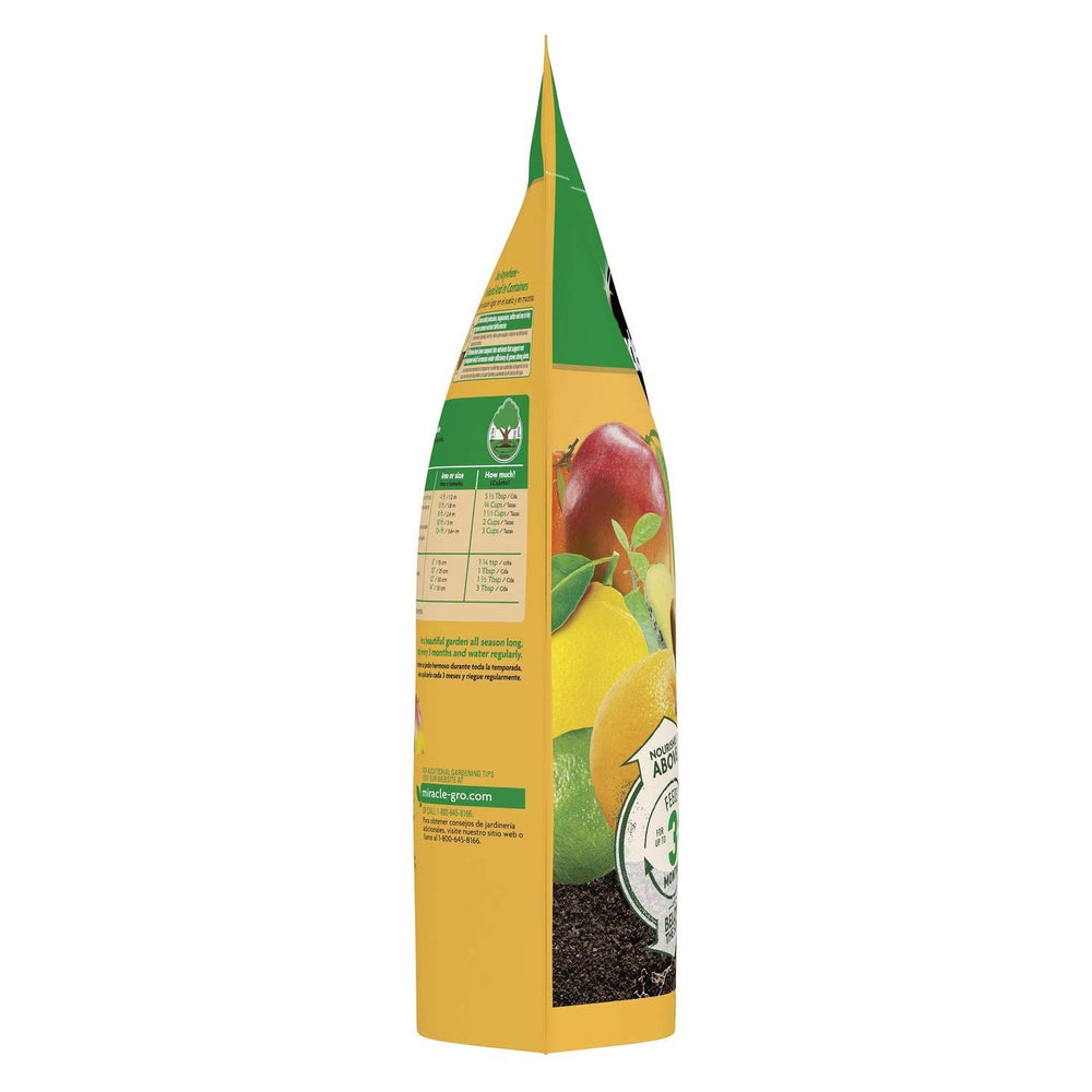 Application of Miracle-Gro Shake 'N Feed to citrus plants