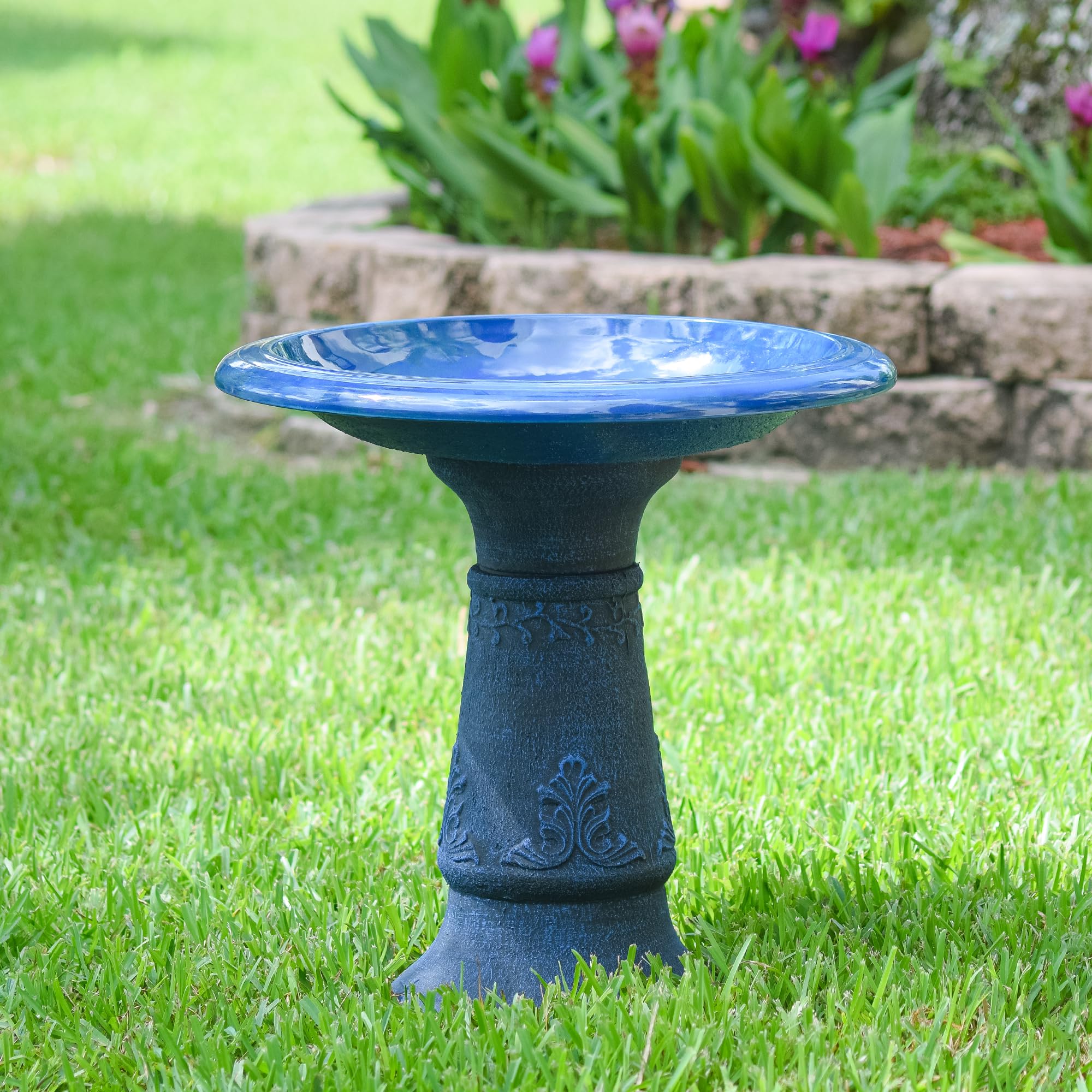 Arcadia Blue Bird Bath filled with water in outdoor space