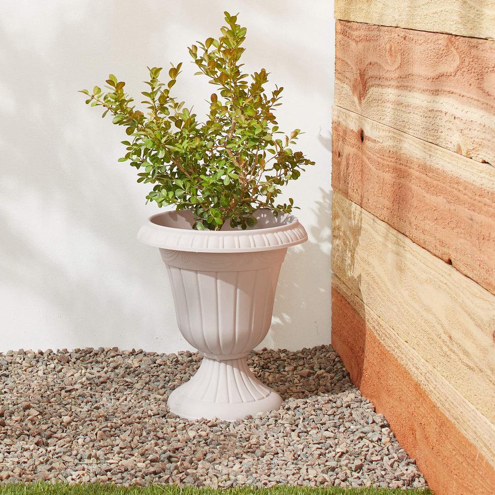 Arcadia Garden Products urn planter with flowers in it
