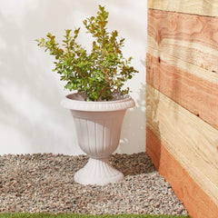 Arcadia Garden Products urn planter with flowers in it
