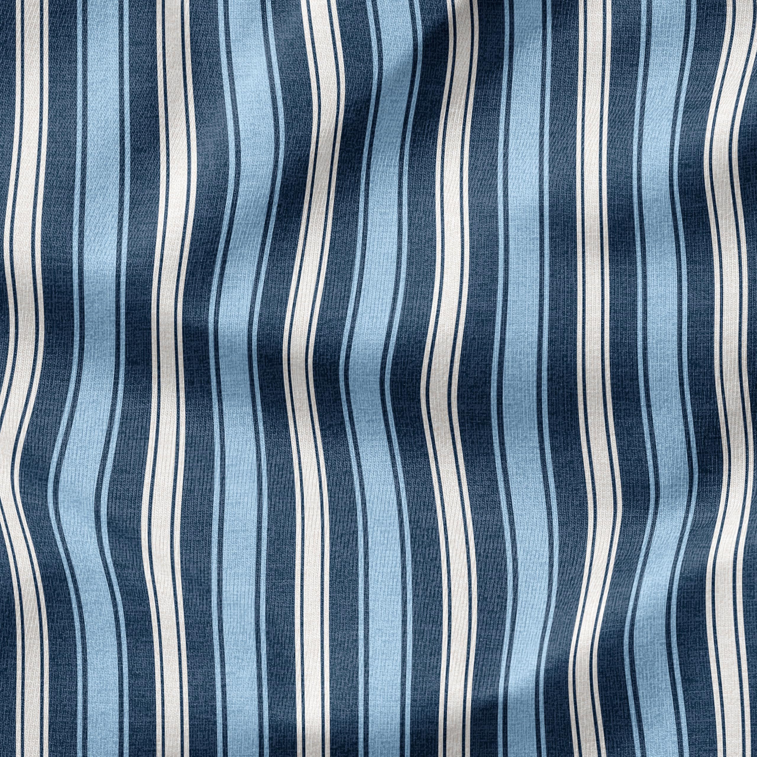 Arden Outdoor Cushion in Striped for the Heart on a garden chair
