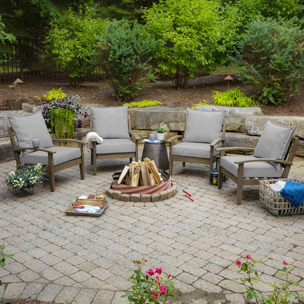 Arden Outdoor Deep Seat Cushion Set in a garden setting