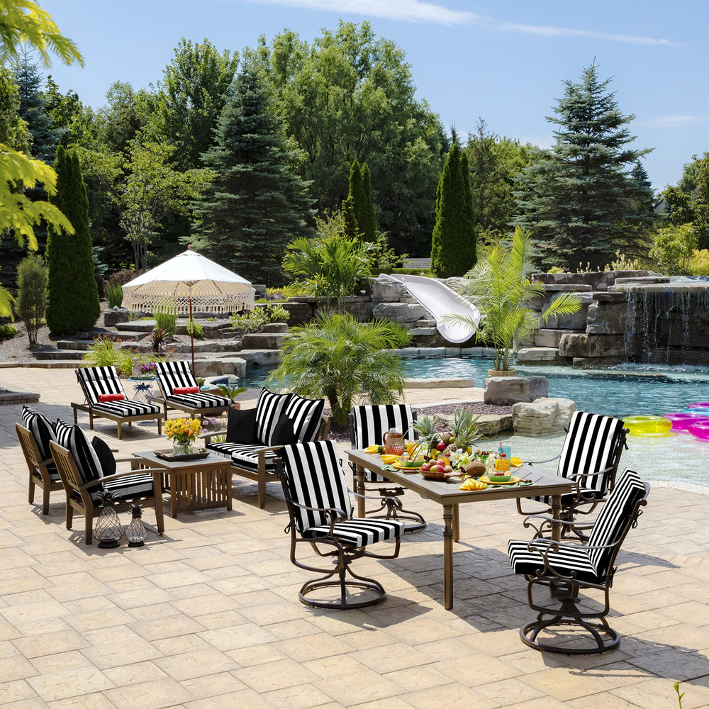 Arden Outdoor Dining Chair Cushion on a patio dining set