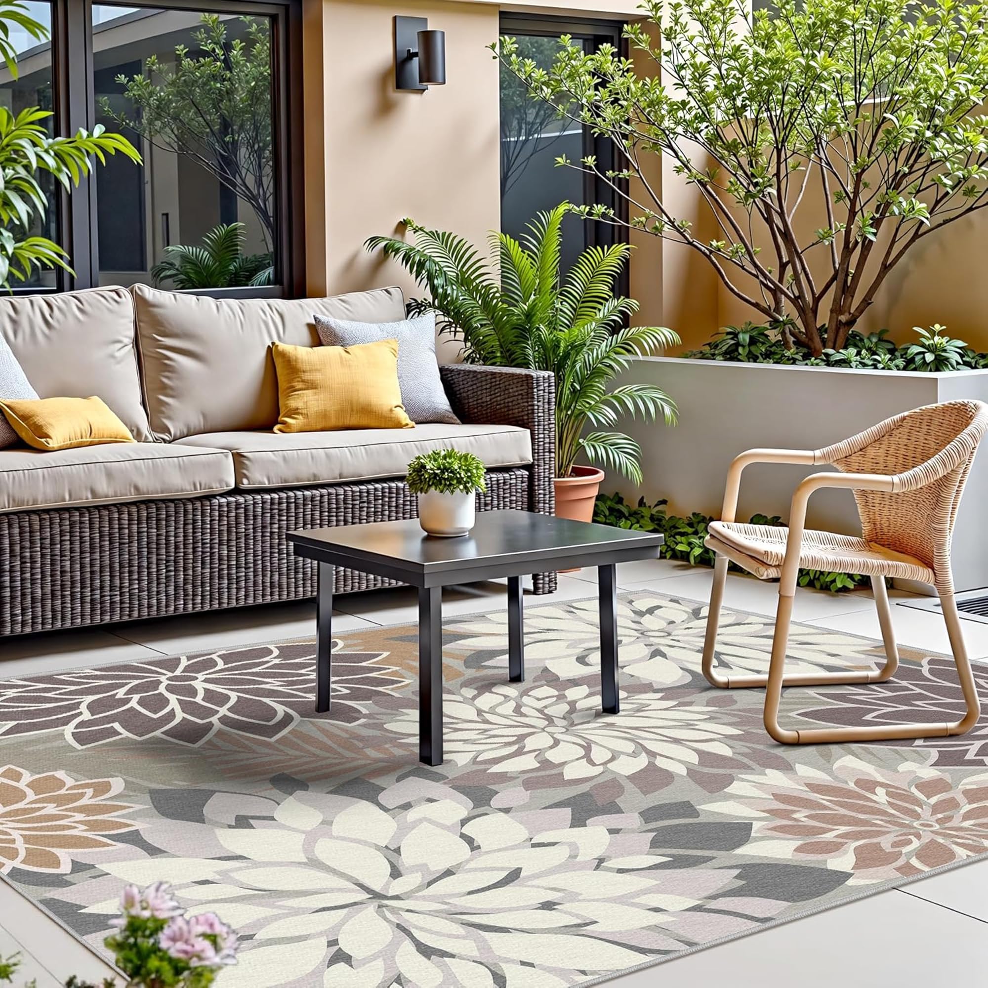 Arenarug floral outdoor rug in a garden setting
