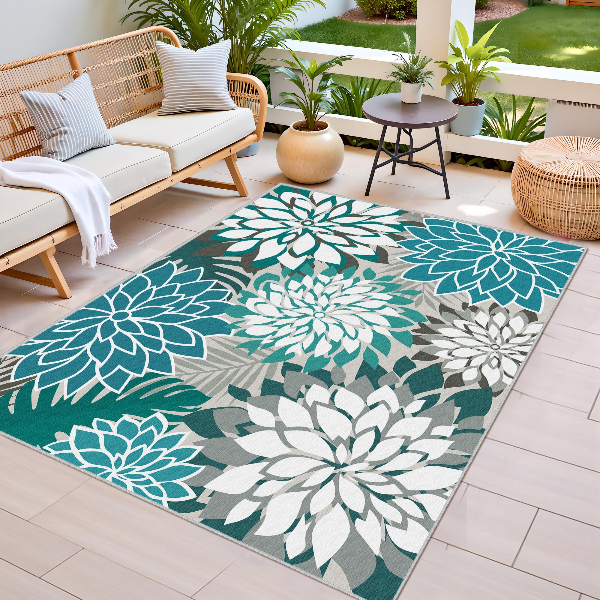 Arenarug Outdoor Rug 5' x 8' teal rug in garden setting