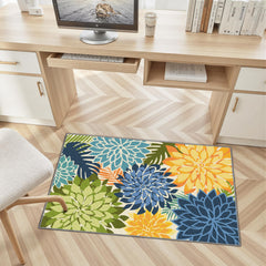 Arenarug Outdoor Rug displayed on a patio
