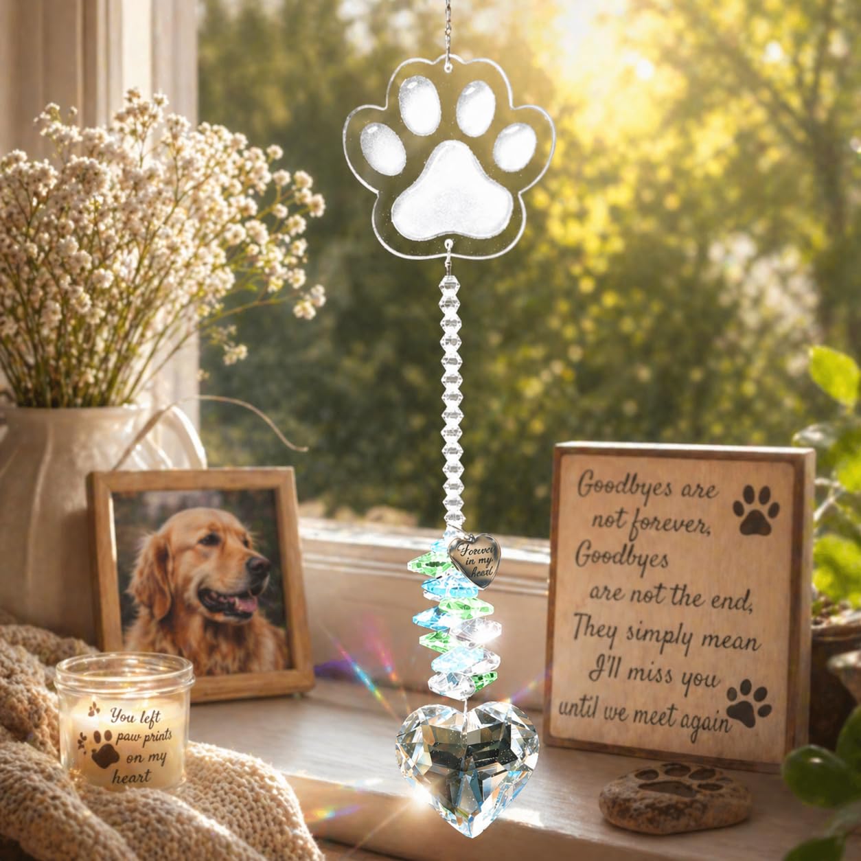 ARUN Pet Memorial Suncatcher on a patio table with flowers