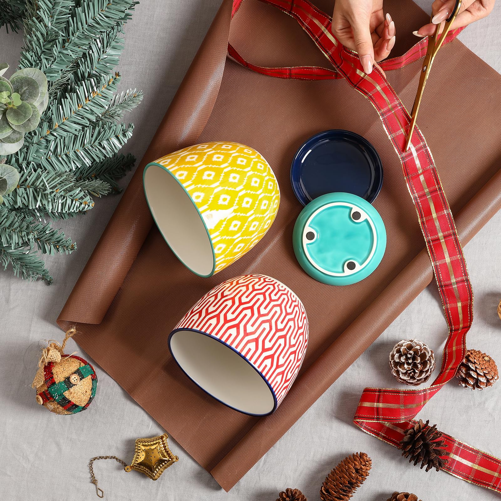 Assorted Selamica ceramic pots with herbs on windowsill