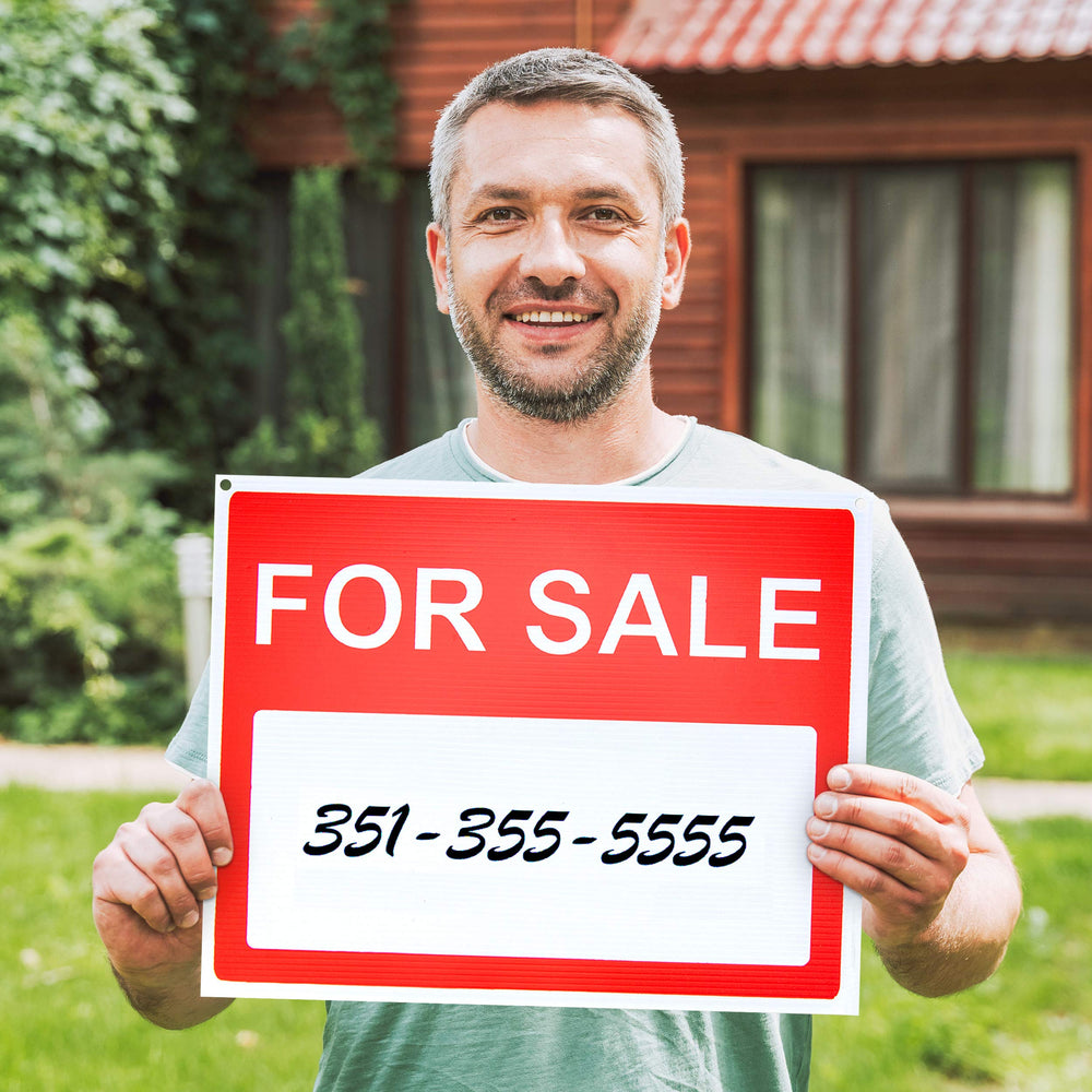 ASSURED SIGNS For Sale Sign Car in outdoor setting