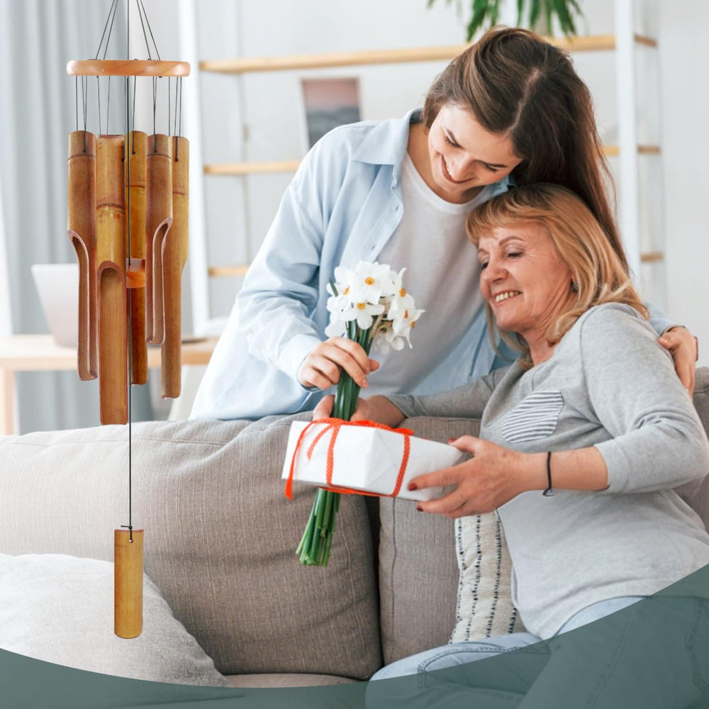 ASTARIN Bamboo Wind Chimes with background of greenery