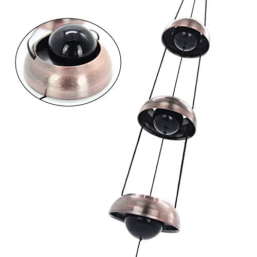 ASTARIN Copper Wind Chimes in a serene outdoor setting
