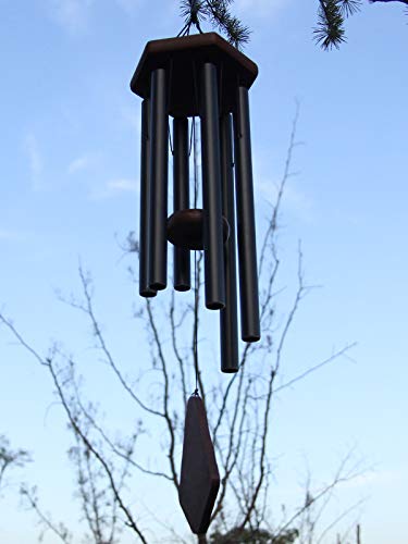 ASTARIN wind chime hanging on a porch rail