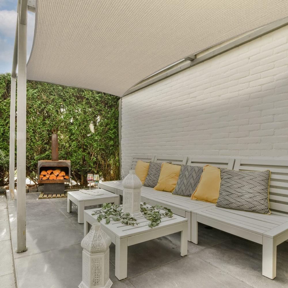 AsterOutdoor Sun Shade Sail attached to structure in garden