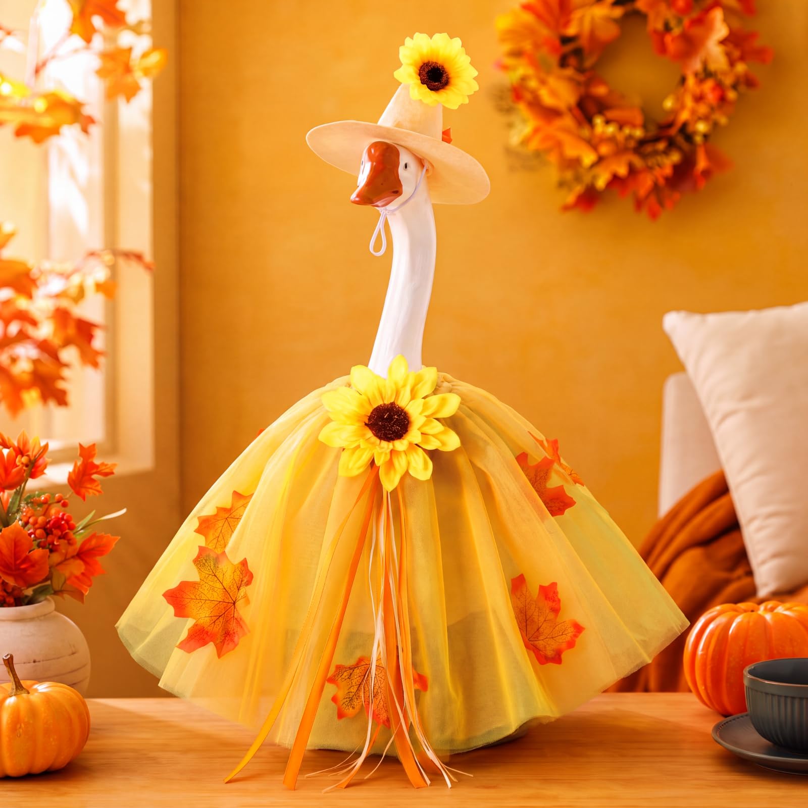 Autumn-themed goose costume displayed in a garden setting