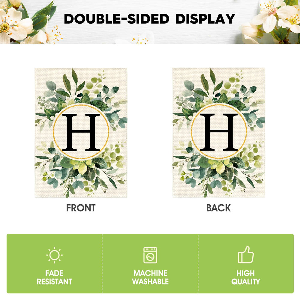 AVOIN Monogram H Floral Garden Flag on a patio