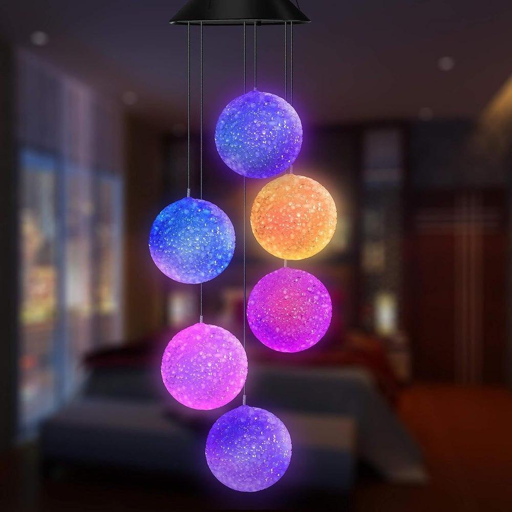 AWENDIETOU Solar Wind Chime illuminated at night