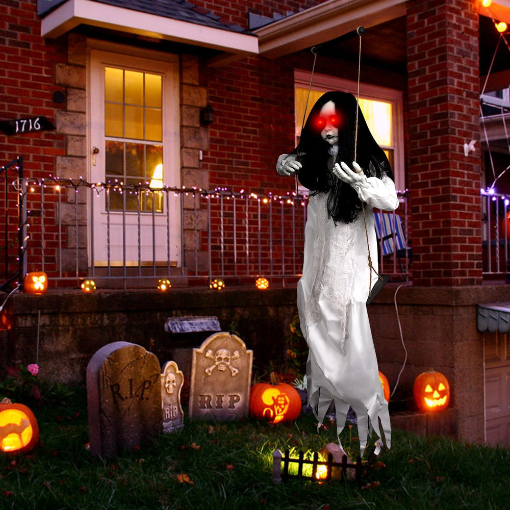 Axcoix swinging doll girl displayed at a Halloween party