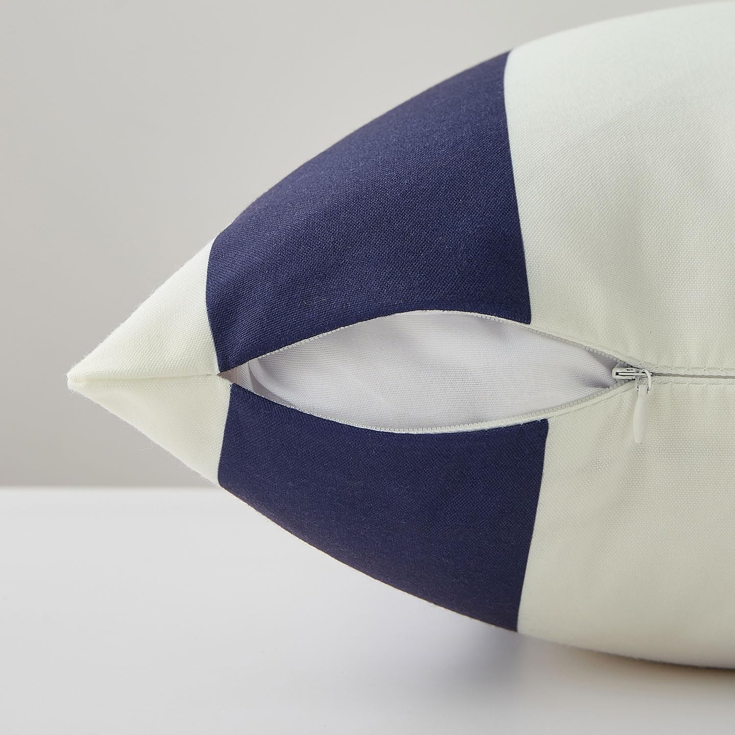 Back view of Allorry Outdoor Pillow Cover 20x20 navy blue striped