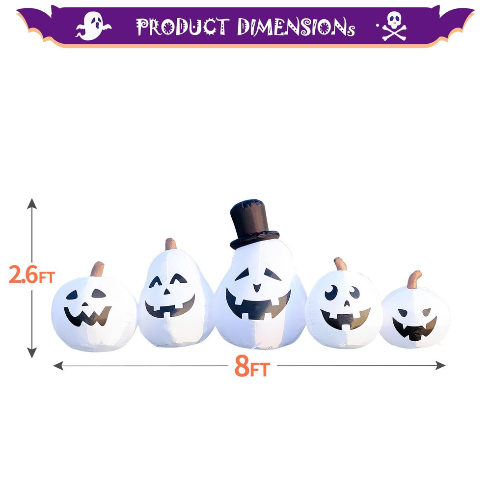 Back view of DomKom inflatable pumpkin showing the fan and stability ropes