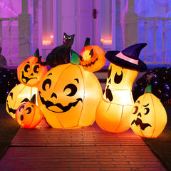 Back view of Joiedomi inflatable pumpkins showing ground stakes