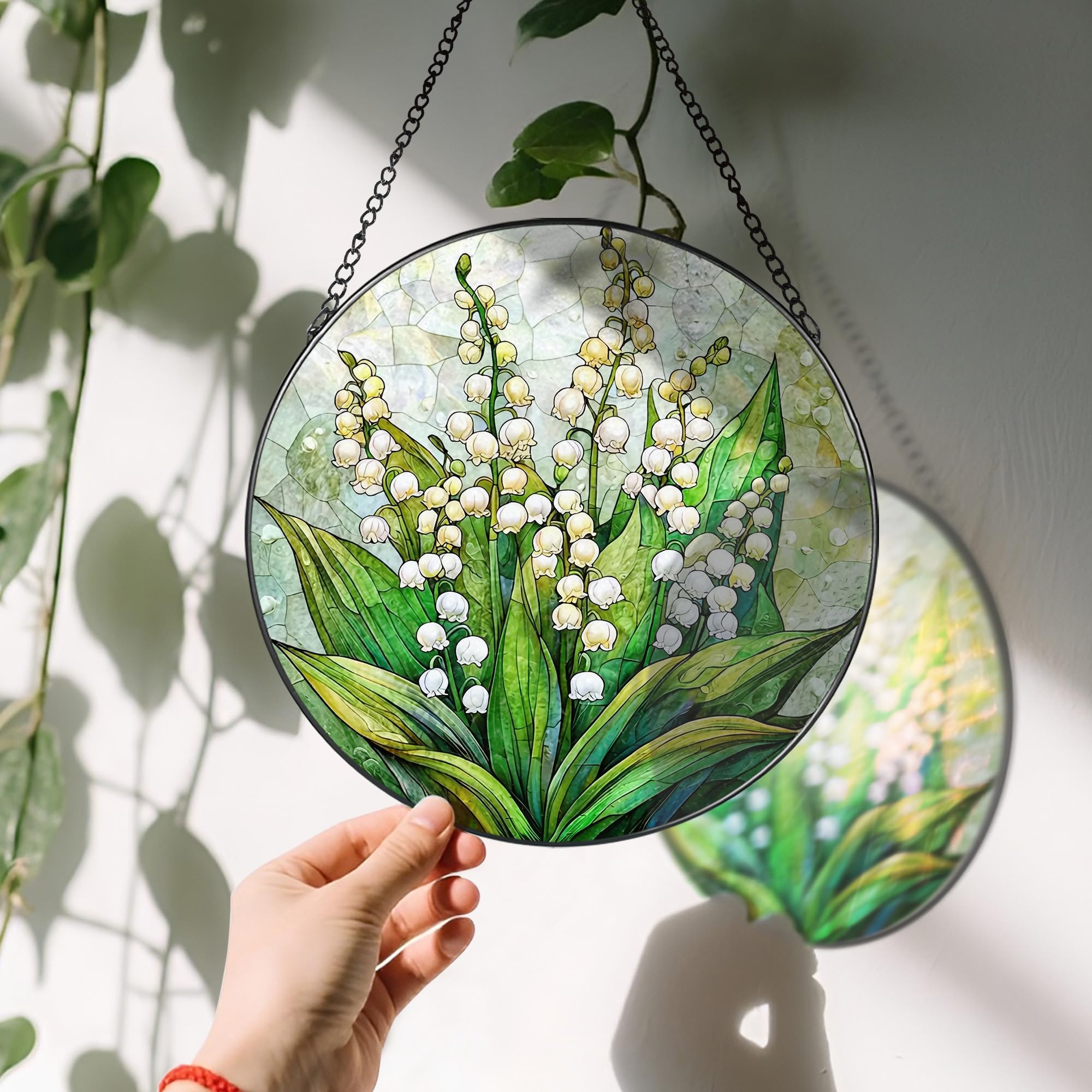 Back view of LAOWEIKI stained glass sun catcher with suction hook