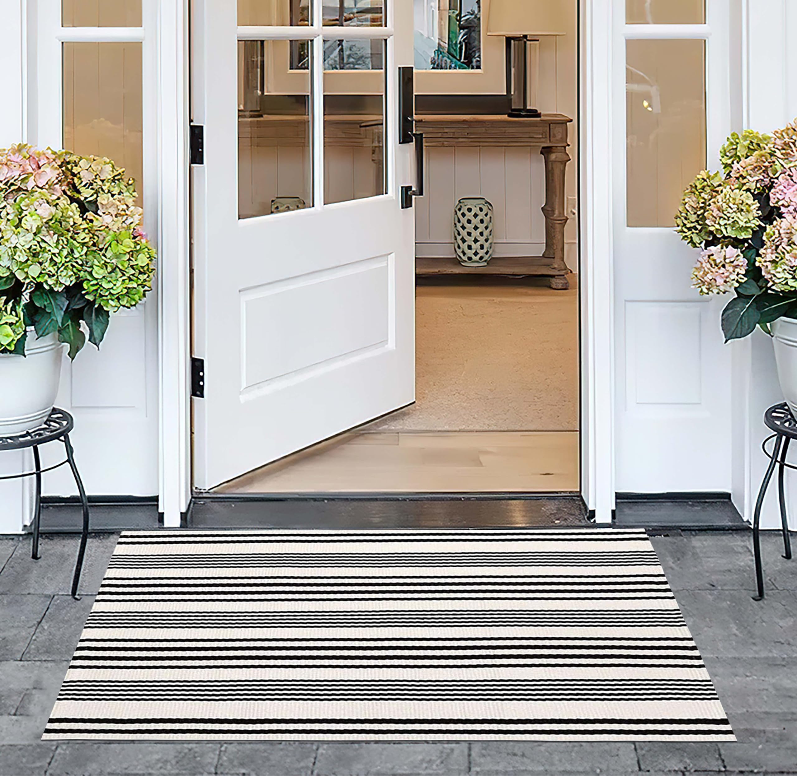 Back view of the BUAGETUP Black and White Striped Doormat