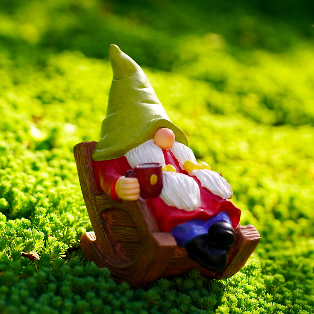 Back view of the garden gnome statue showing its detailed paint