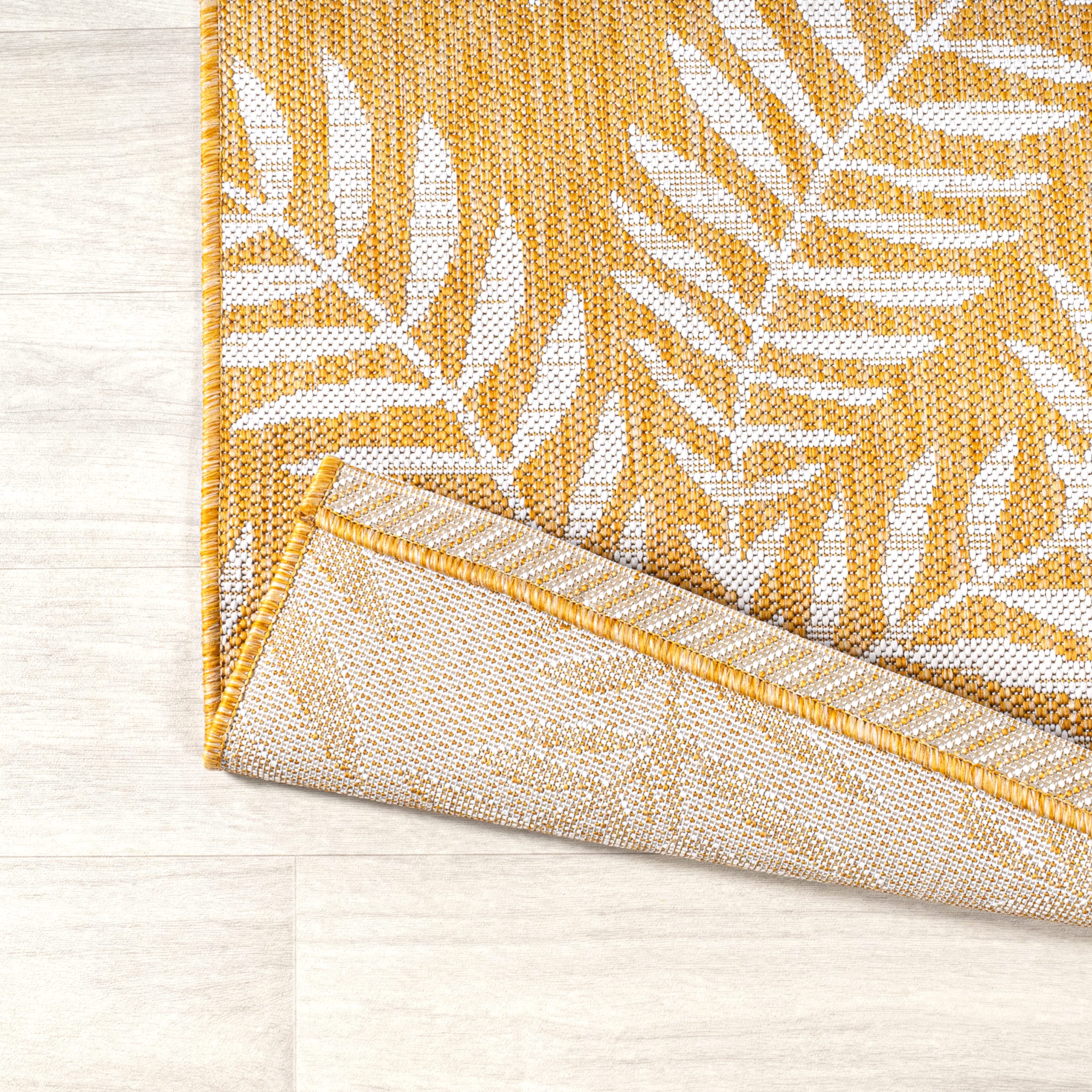 Back view of the JONATHAN Y Palm Frond Indoor Outdoor Runner Rug