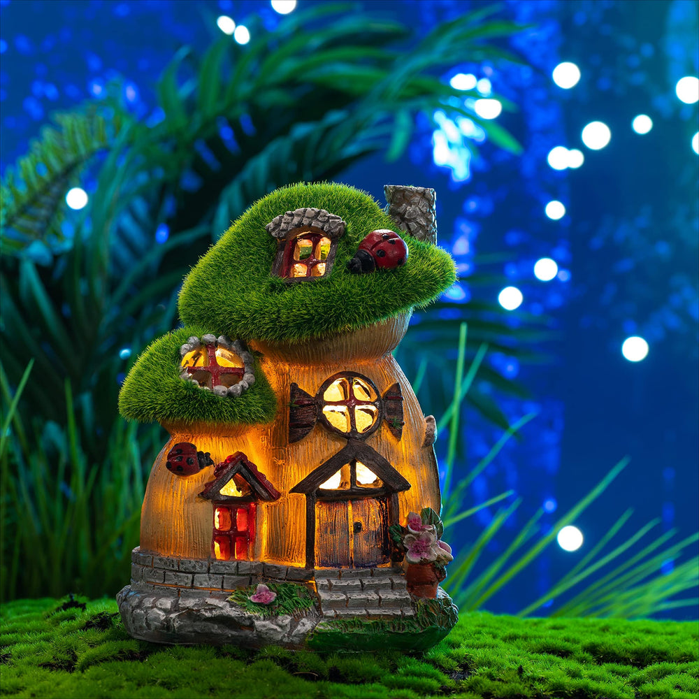 Back view of the mushroom statue with solar light attachment