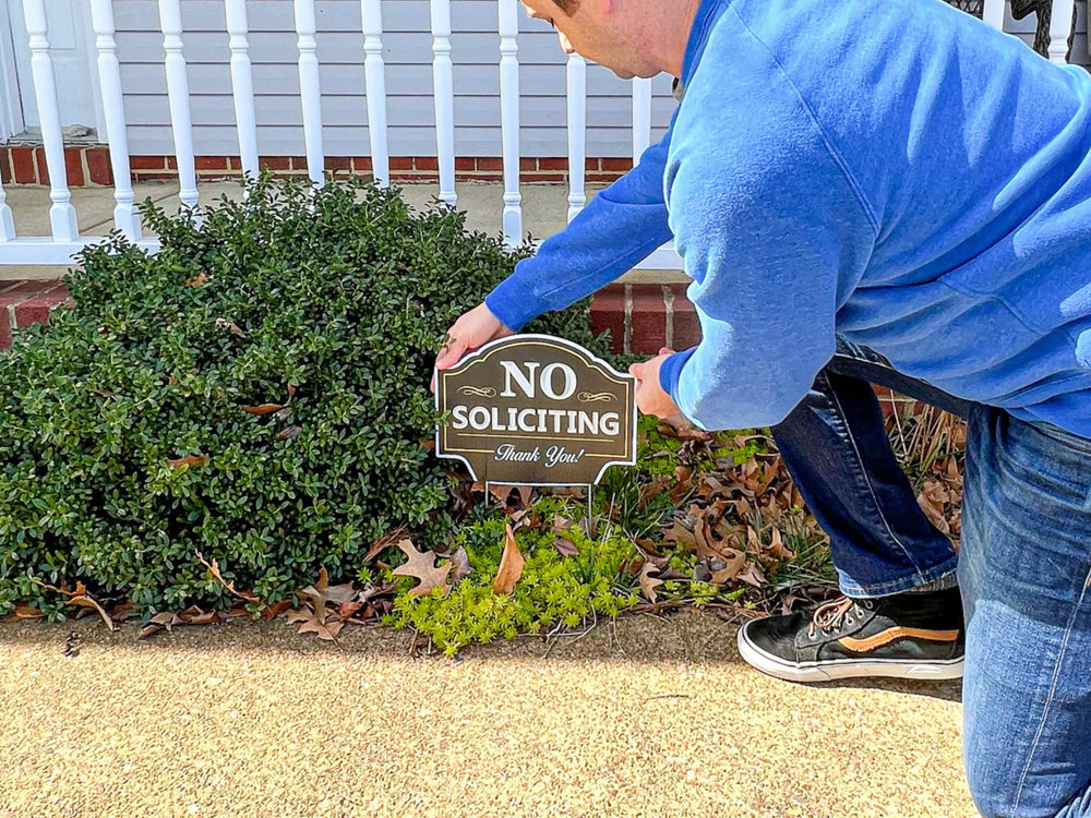 Back view showing the metal H-stake of the No Soliciting Sign