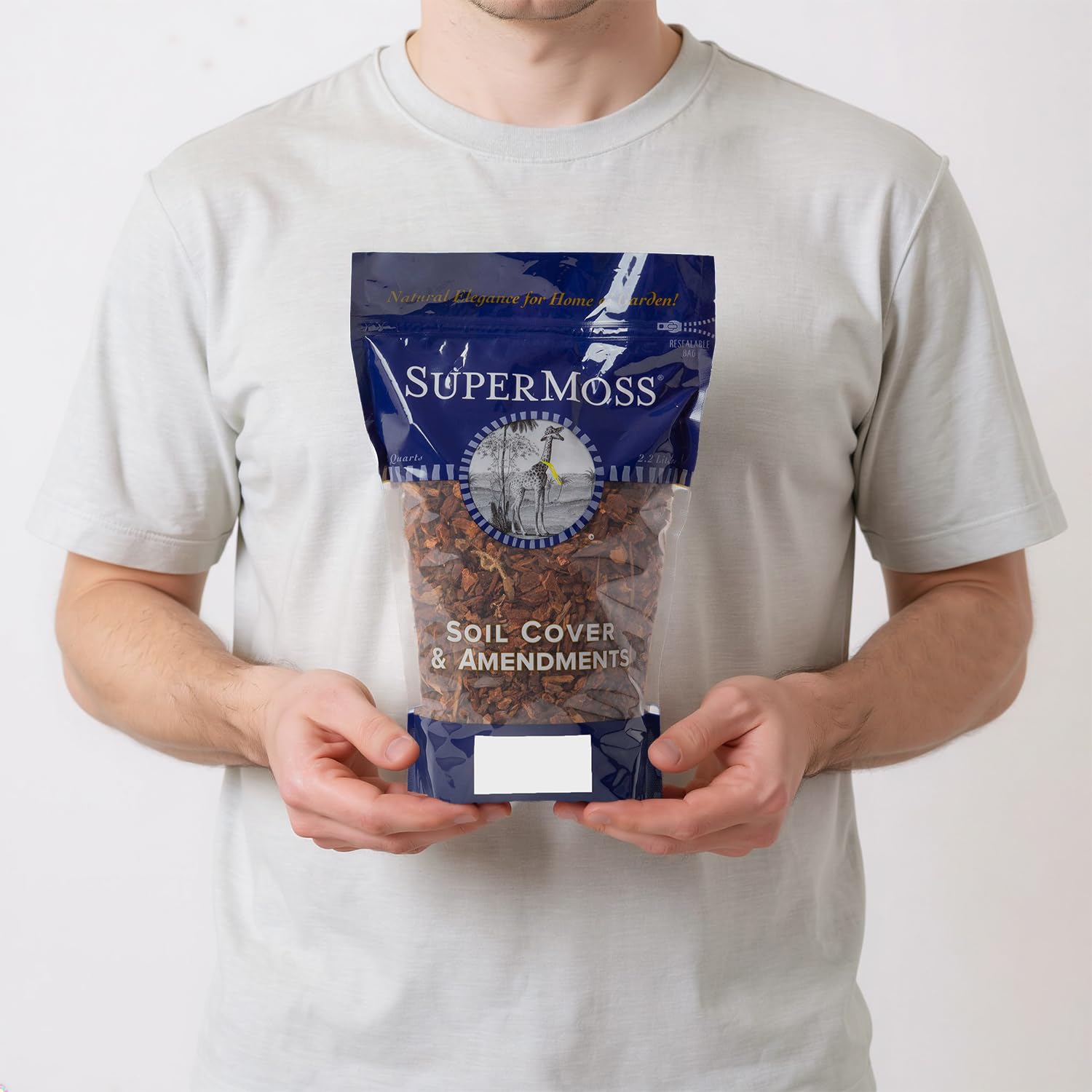 Bag of SuperMoss Orchid Bark with orchids in background