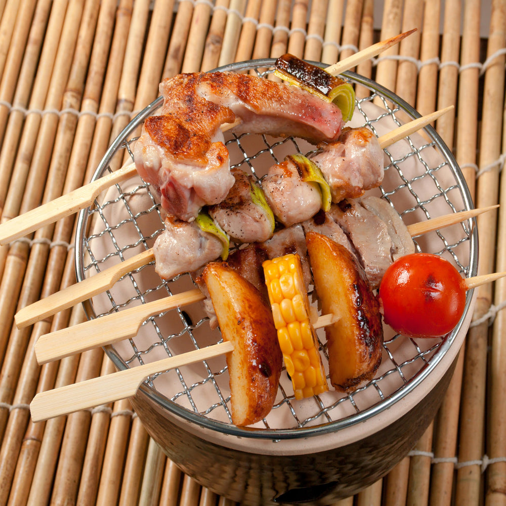 Bamboo skewer with grilled vegetables and shrimp