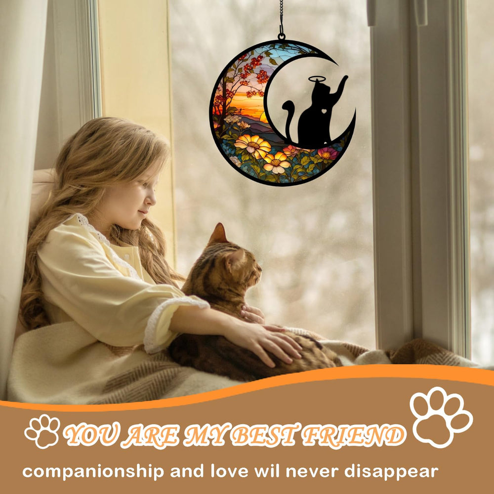 BamLue Cat Memorial Suncatcher hanging in a garden